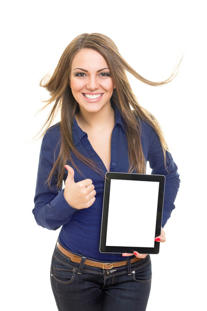 Cheerful female student showing digital tablet screen gesturing thumb up - Foto, Imagen