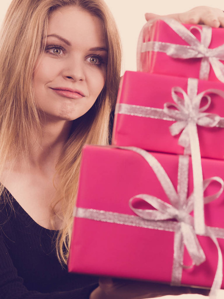 Happy surprised woman with many gifts - Фото, зображення