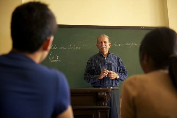 School , professor talking to students during lesson in co - Photo, Image
