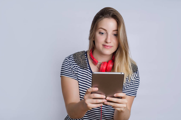 Young woman using digital tablet. - Photo, Image