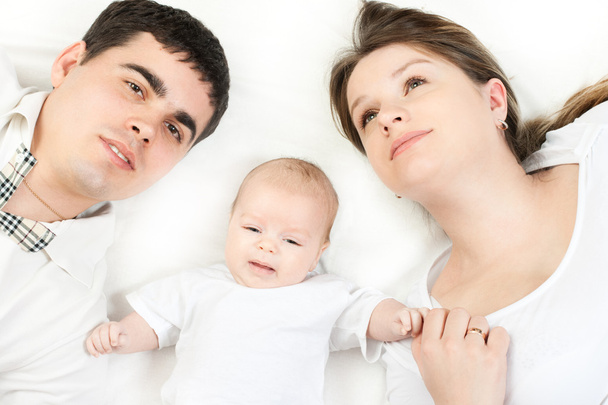 Happy family - mother, father and baby - Photo, Image