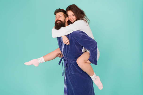 Deep in love. Having fun. Perfect morning. Happy family couple. woman and bearded man in robe. romantinc couple in love. Honeymoon trip. Cheerful couple. Love time. Life together. Feeling of love - 写真・画像