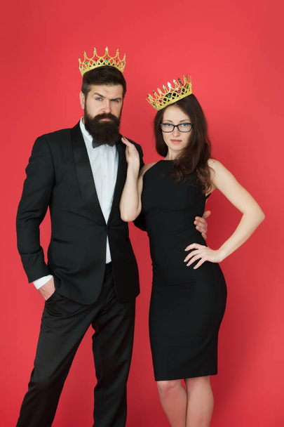 Visiting event or ceremony. Couple ready for award ceremony. Main rules picking clothes. Corporate party. Award ceremony concept. Bearded gentleman wear tuxedo girl elegant dress. Formal dress code - Foto, Imagen