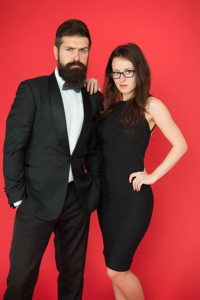 He will melt your heart. Bearded man and woman dating. couple in love on date. Formal couple of man in tuxedo and sexy woman. romantic date. formal fashion look. Proposal or engagement party. Romance - Φωτογραφία, εικόνα