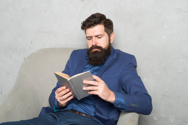 Reading authority business book. Business experience. Decision making part management. Man bearded businessman thoughtful face inspired by book making decision. Business decision. Useful information - Photo, Image