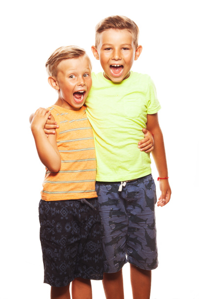 Ready for vacation concept. Portrait of two funny screaming boys - Photo, Image