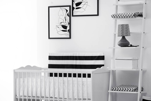 Baby bedroom interior with crib and beautiful decor elements - Foto, Imagen