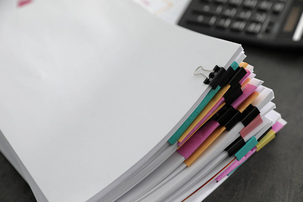 Stack of documents with paper clips on office table. Space for text - Foto, Imagem
