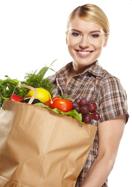 Portrait of happy business woman holding a shopping bag - Valokuva, kuva