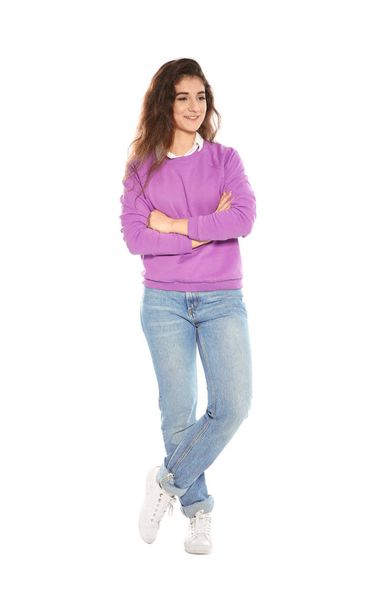 Beautiful young woman in stylish clothes on white background - 写真・画像