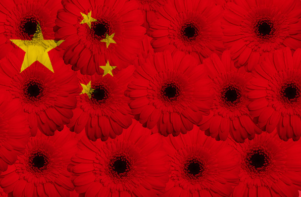 stylized national flag of china with gerbera flowers - Photo, Image