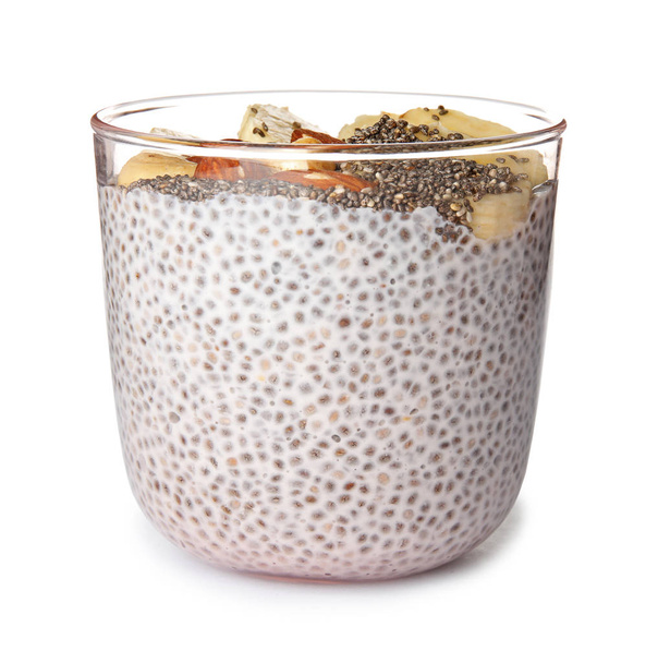Dessert bowl of tasty chia seed pudding with banana on white background - Fotó, kép