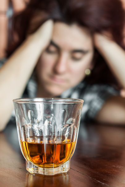 Drunk and depressed hispanic woman - Fotoğraf, Görsel