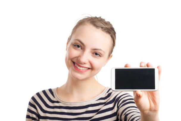 Young blond woman showing blank phone screen - Foto, afbeelding