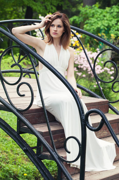 Elegant bride girl in white dress outdoor. Beautiful woman portr - Photo, Image