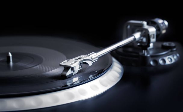 vinyl laying on a record player - nightclubbing, dj etc. - Фото, изображение