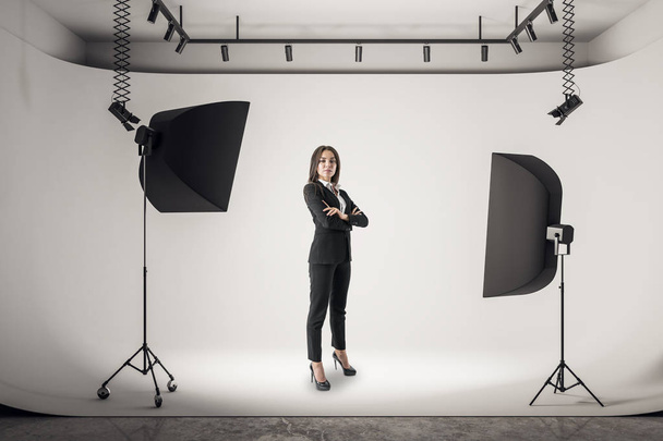 Businesswoman in photo studio  - Φωτογραφία, εικόνα