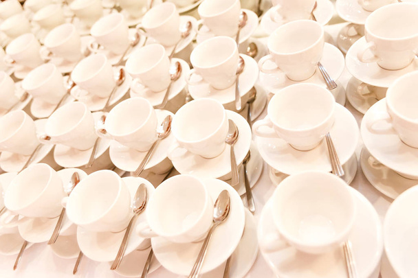 white tea cups and saucers - Фото, зображення