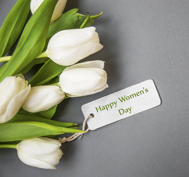 White tulips bouquet with label card , women's day greeting card - Photo, Image
