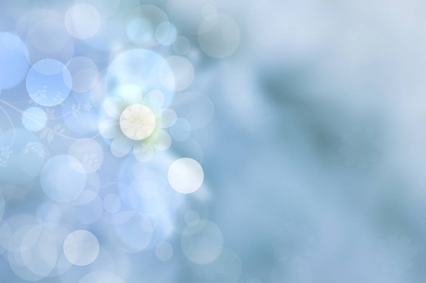 Sunny abstract bright blue bokeh spring or summer background texture with leaves. Space for your design. - Foto, imagen