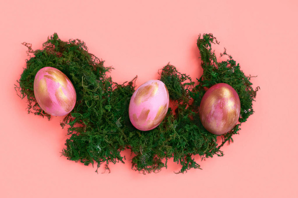 Easter eggs on coral background.  - Photo, Image
