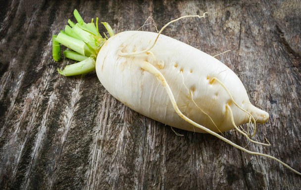 Fresh white radish on wooden background / White Turnip - Photo, Image
