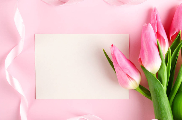 Spring mood concept. Pink flowers arrangement with a lot of copy space for text. - Fotó, kép