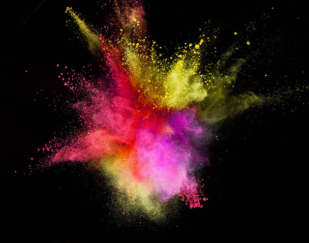 Colored powder explosion on black background. - Фото, зображення