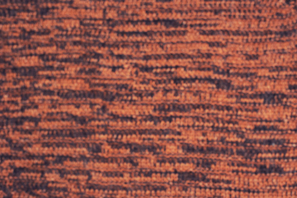 Tessitura lavorata a maglia sfondo arancione vista dall'alto piatto sfocatura
 - Foto, immagini