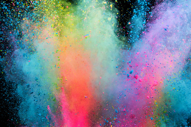 Colored powder explosion on black background. - Foto, Bild