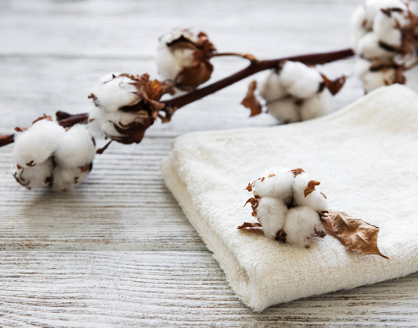 flor y toalla de algodón
 - Foto, imagen