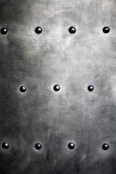 Black metal plate or armour texture with rivets - Zdjęcie, obraz