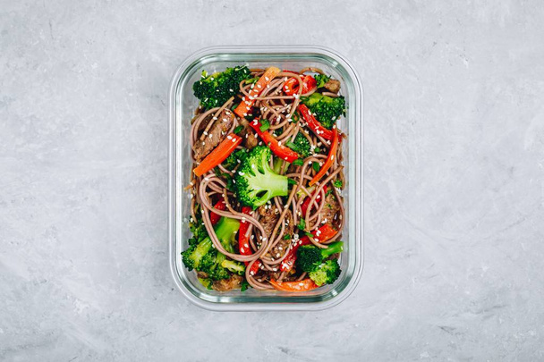 Beef broccoli noodles stir fry meal prep lunch box container - Photo, Image