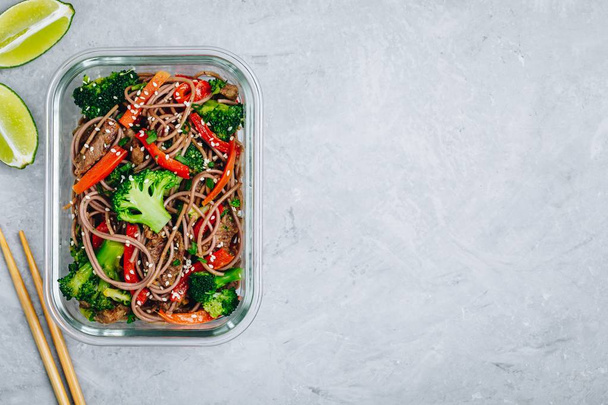Beef broccoli noodles stir fry meal prep lunch box container - Photo, Image