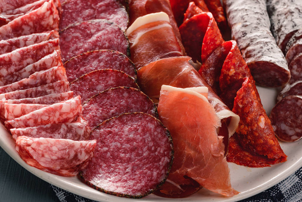 Close up on cured meats - Фото, зображення