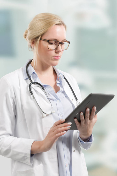 female doctor with stethoscope and clipboard - Photo, Image