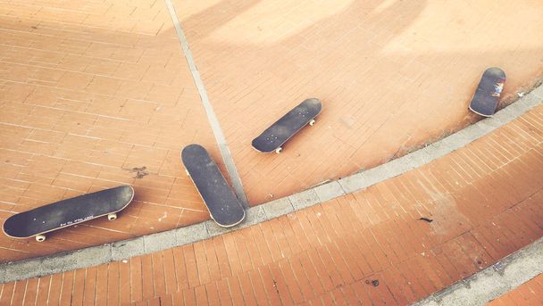 Skateboard on the road used to make fantastic evolutions  - Photo, Image