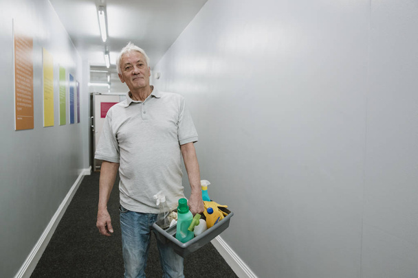 Portrait of a Senior Cleaner - Foto, Imagen