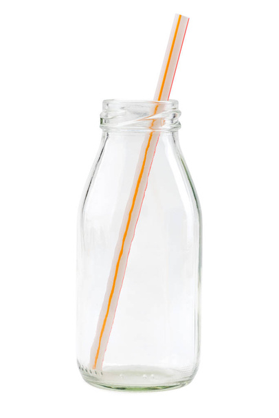 Glass bottle with a straw - Fotó, kép