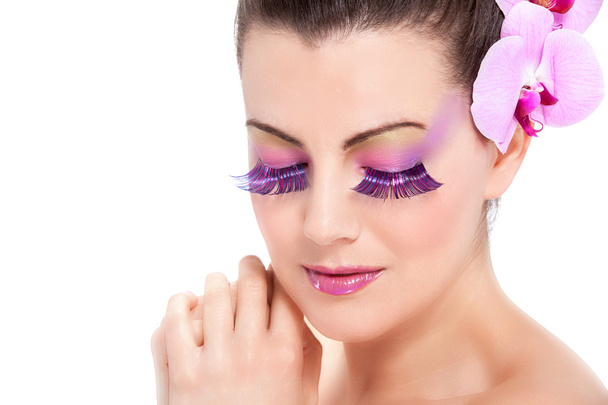 Beautiful Spring makeup with orchid flowers - Fotografie, Obrázek