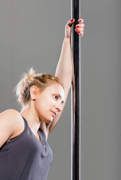 pole dance girl, pole fitness - Фото, изображение