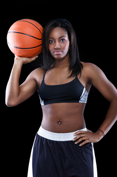 Attractive black woman with basketball - Фото, зображення