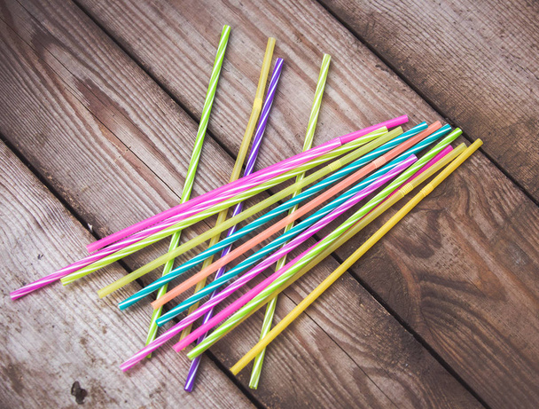 Plastic straws on wooden background plastic free concept - Photo, Image