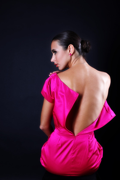 Lovely woman in pink dress - Foto, afbeelding