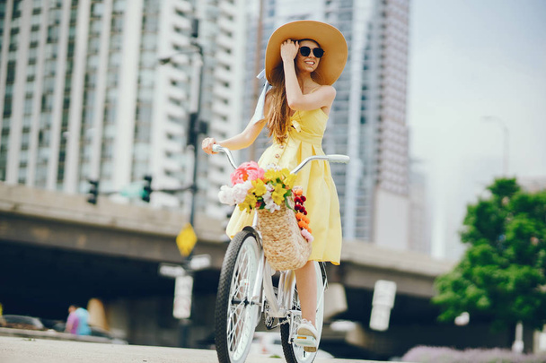pretty girl with bicycle - Фото, зображення