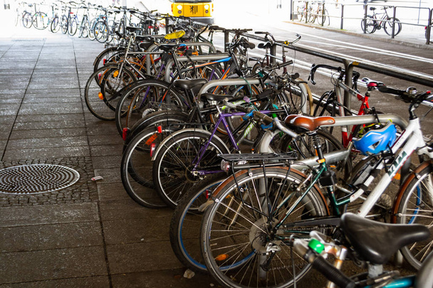 Bicycle parking in a big city near the road - Foto, immagini