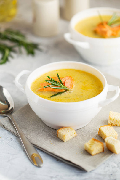 Fish cream soup with Salmon, cheese, Potatoes and herbs - Photo, Image