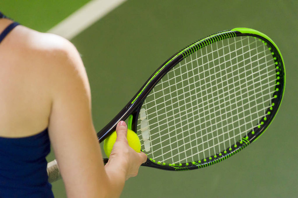 Tennis player holding racket and ball in hands - Foto, Imagem