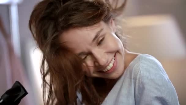Sensual woman face drying hair. Cheerful girl face enjoy haircare. Female beauty - Video, Çekim