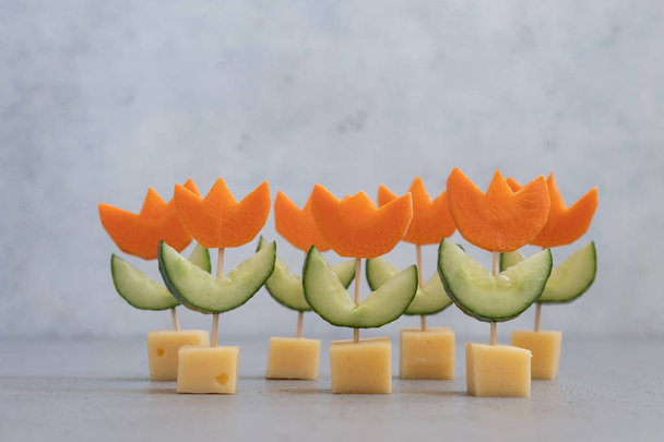 Canape with cucumber, carrot and cheese - Фото, изображение